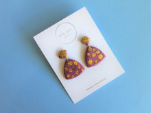 Load image into Gallery viewer, Random Resin - Purple and Gold Glitter Triangle Dangle
