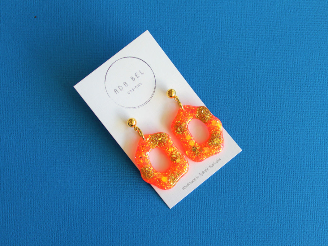 Random Resin - Neon Orange and Gold Glitter Dangle with gold ball top